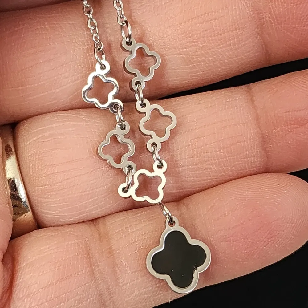 Silver Stainless Steel and Black Quatrefoil Flower Clover Necklace Earring Set - Image 3