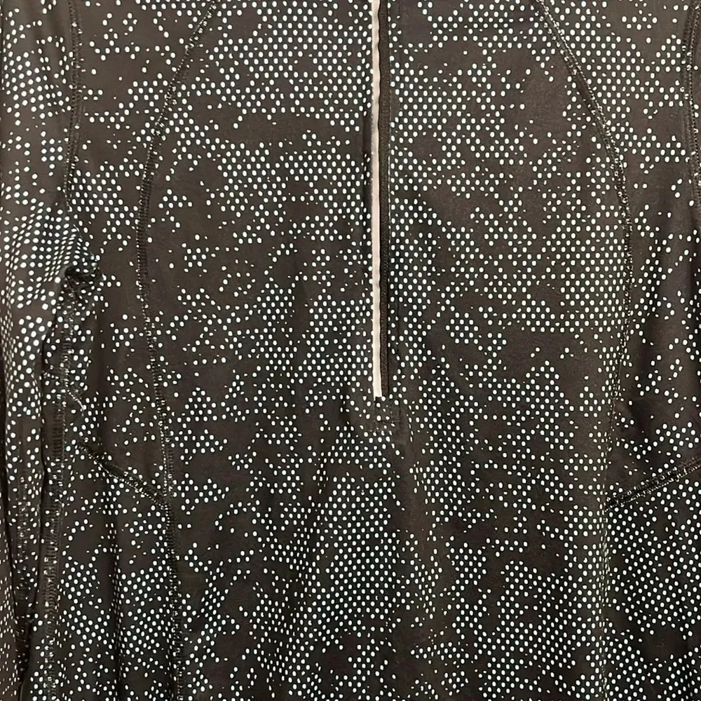 Champion activewear top.  Size large. 1/2 zip pullover. Black with blue dots. - Image 2