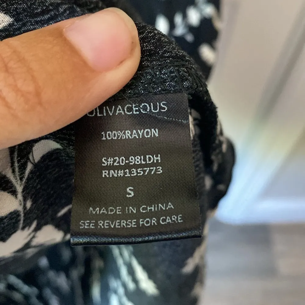 Olivaceous Black and White Floral Print Midi Dress with Short Sleeves - Image 5