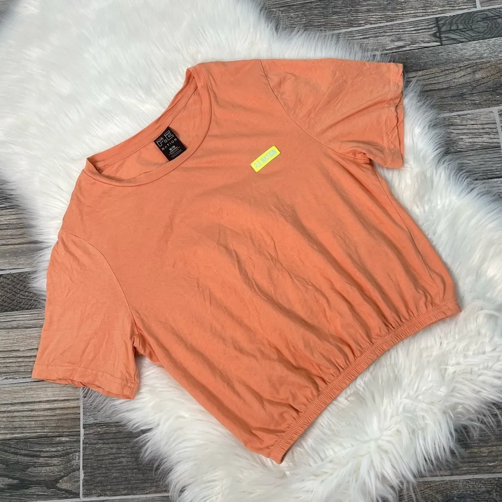 P.E Nation Press Tee in Coral Size M - Image 5