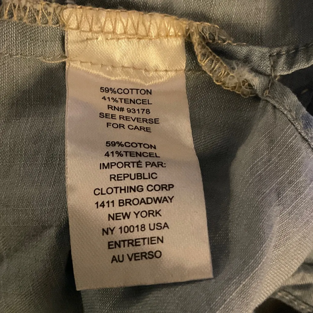 Chelsea & Theodore Blue Ruffle Sleeve Button - Image 5