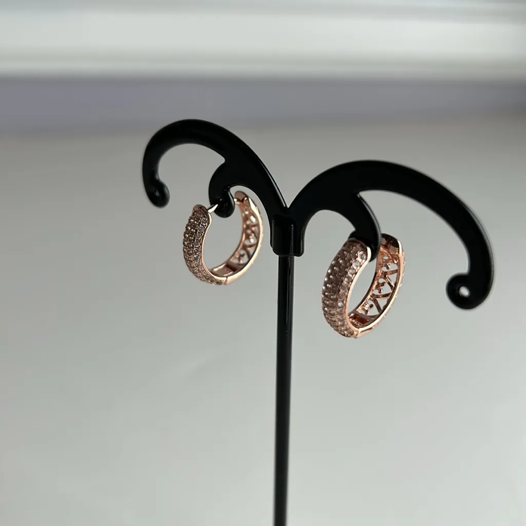 2 pair of rose gold tone sparkling earrings larger pair is from Guess - Image 9