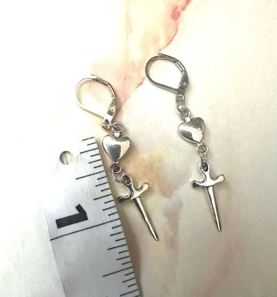 Silver tone heart and cross earrings - Image 2