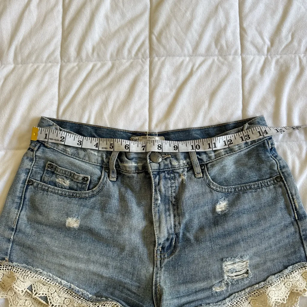 Free People Blue and Cream Jean Shorts with Lace Trim - Image 4