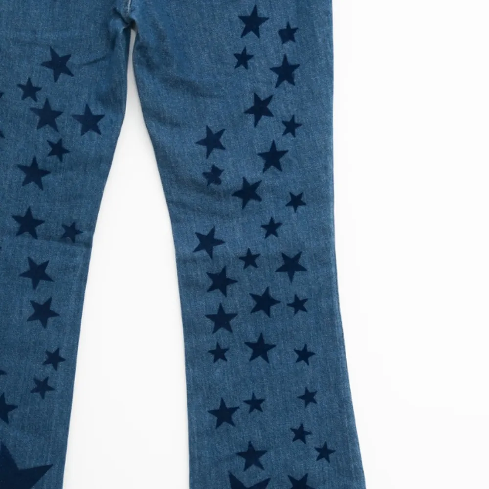 Stella McCartney. Blue Star Print Denim Flared Jeans. - Image 5