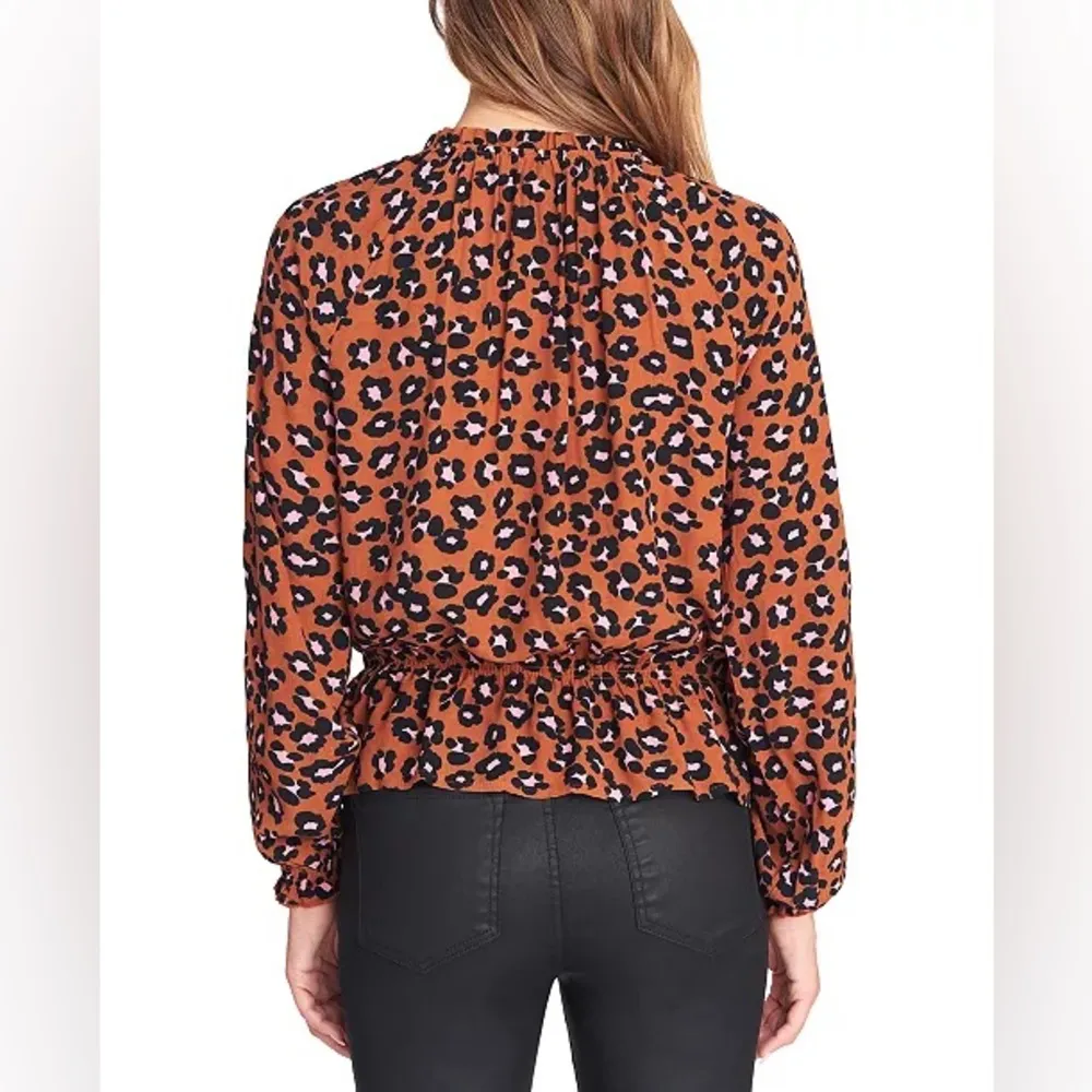 Sanctuary Leopard Print Peasant Blouse with Keyhole opening size large - Image 2