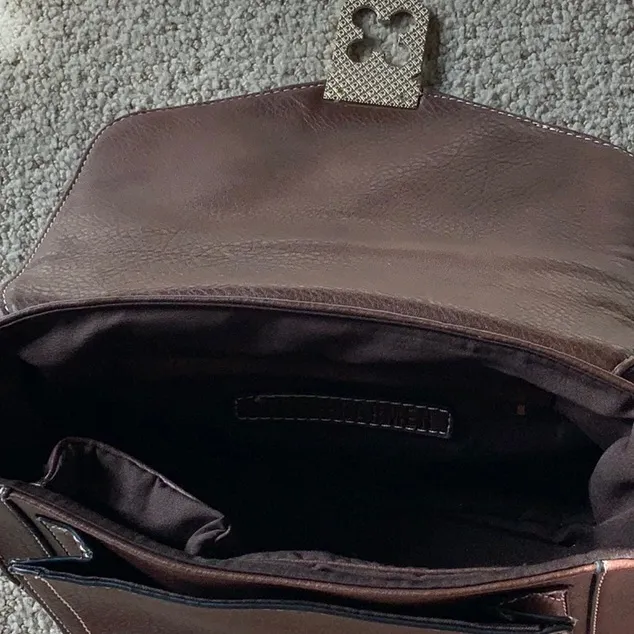 Go with every thing purse in brown with unique front latch and removable strap. - Image 7