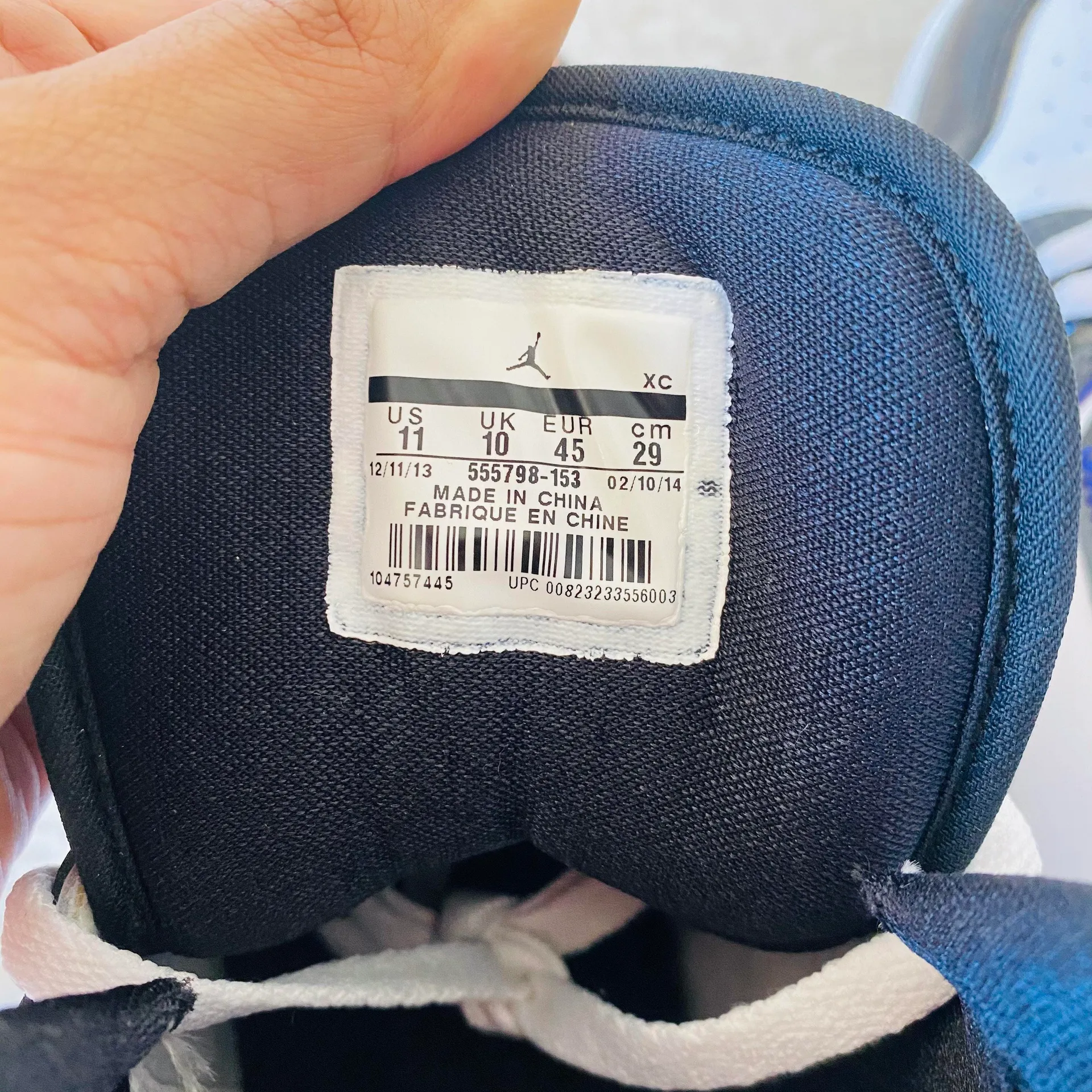 Air Jordan Black and Purple High Top Sneakers - Image 8