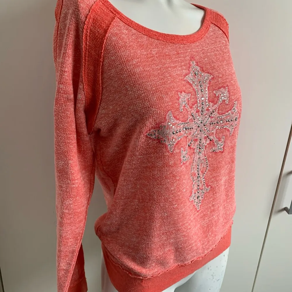 coral colored large rhinestone cross boat neck sweatshirt - Image 2