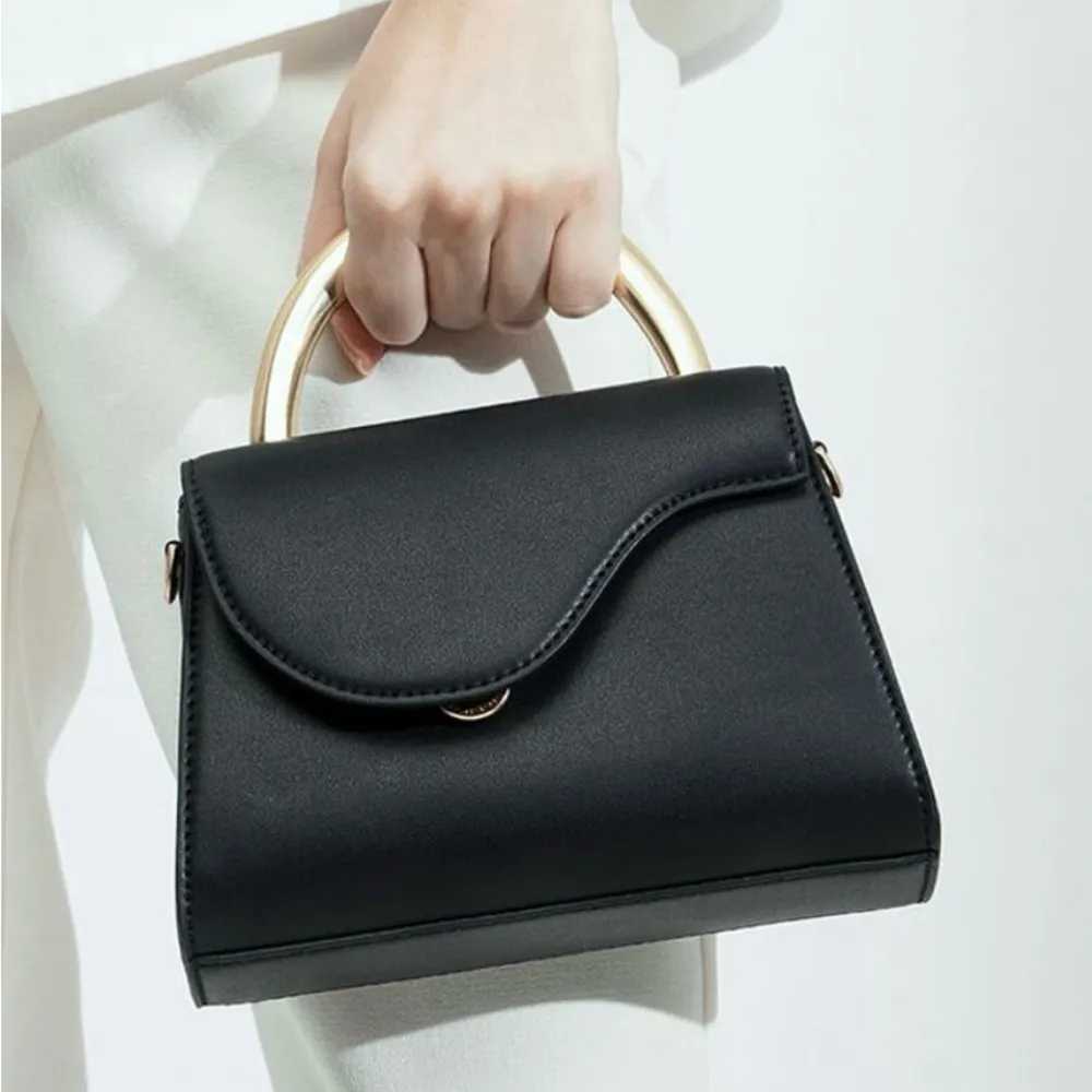 
ANGULAR FLAP METALLIC TOP HANDLE BAG BLACK - Image 8