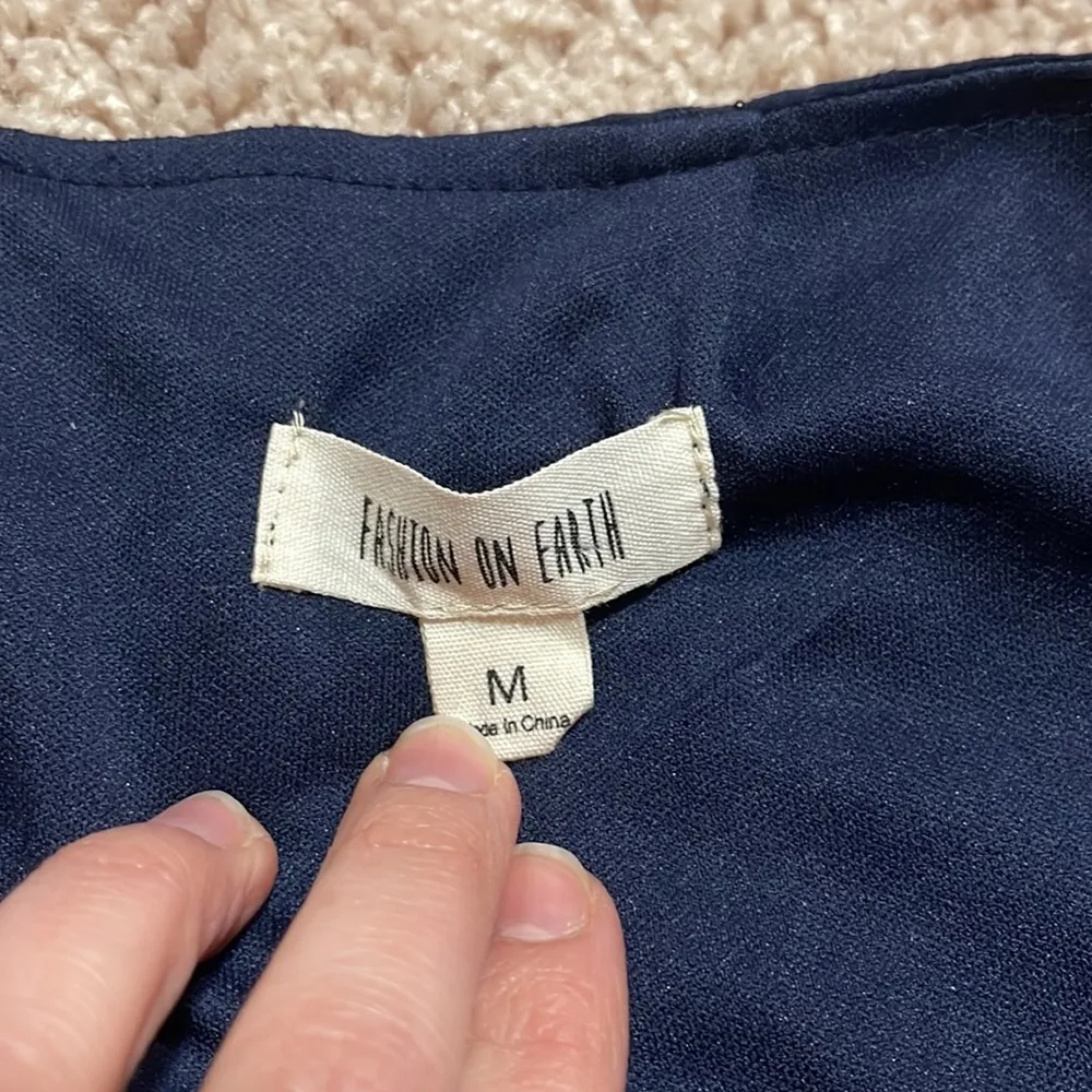 Fashion On Earth Navy Blue Wrap Mini Skirt. - Image 2