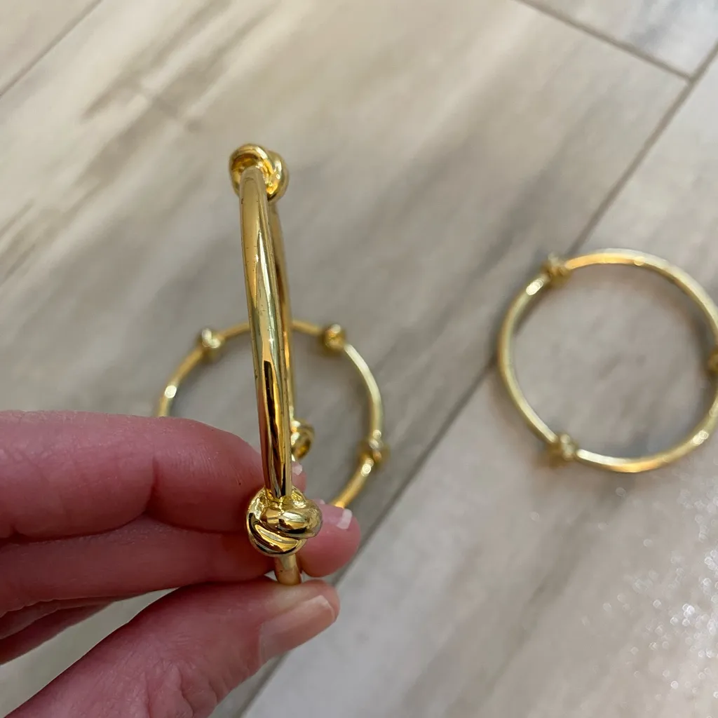 Bundle of Three Coordinating Gold Tone Knot Bangle Stack Bracelets - Image 10