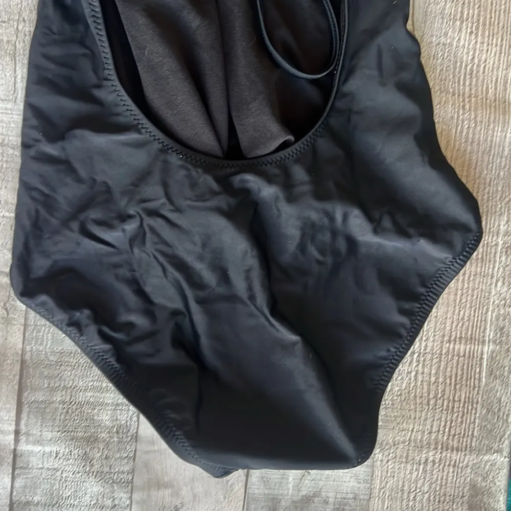 Chic Black Halter Swimsuit with Crochet Detail - Image 4