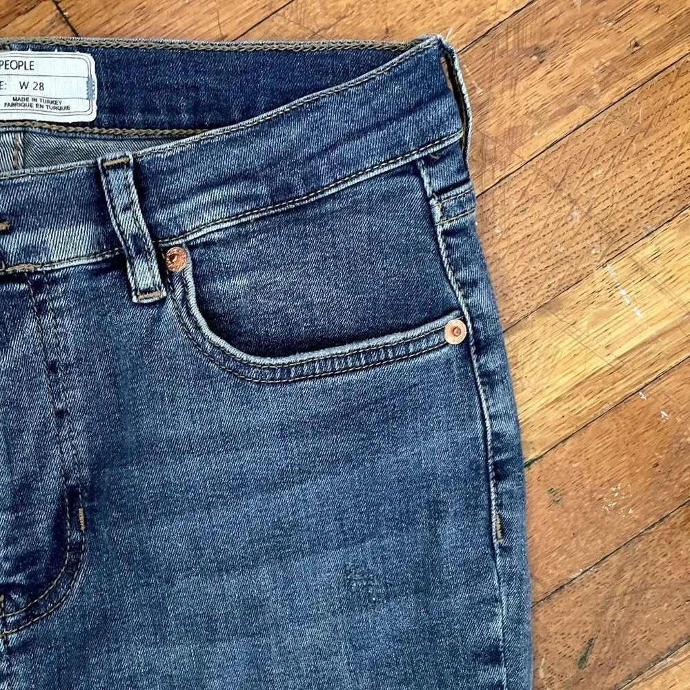 Free People medium wash comfortable casual denim cotton jeans ripped raw hem - Image 2