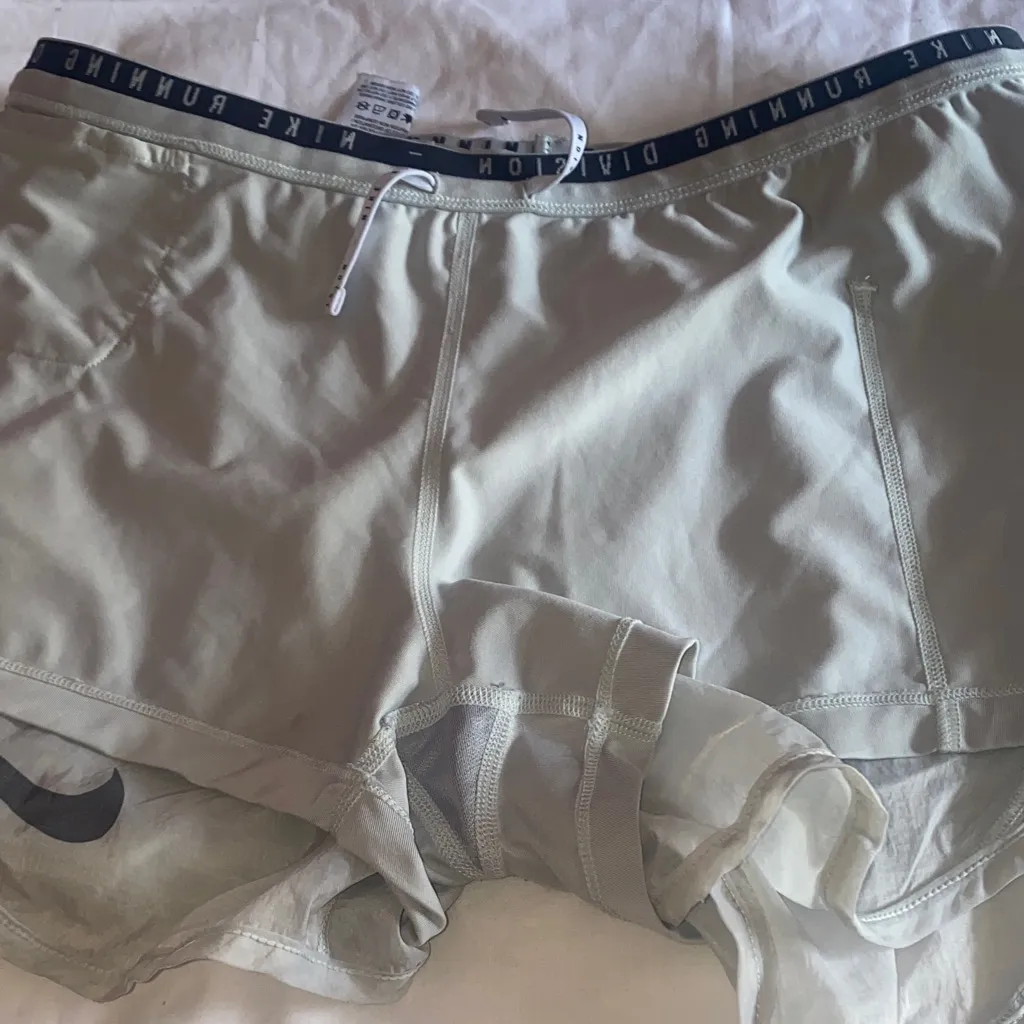 Nike Women's Light Gray Shorts with black Swoosh - Image 7