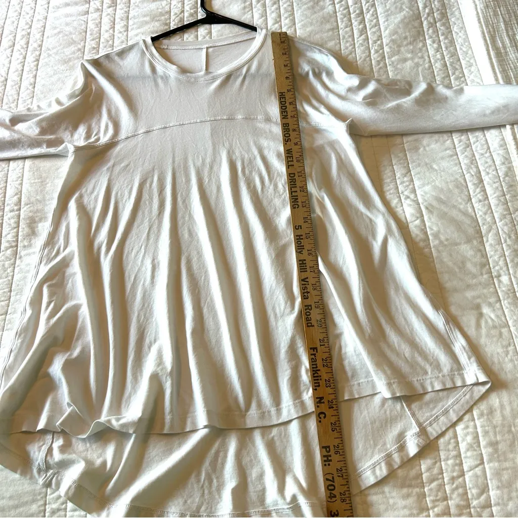 Lululemon Acadia Long Sleeve Solid White
High-Low Swing Tee. Probable Small. - Image 9