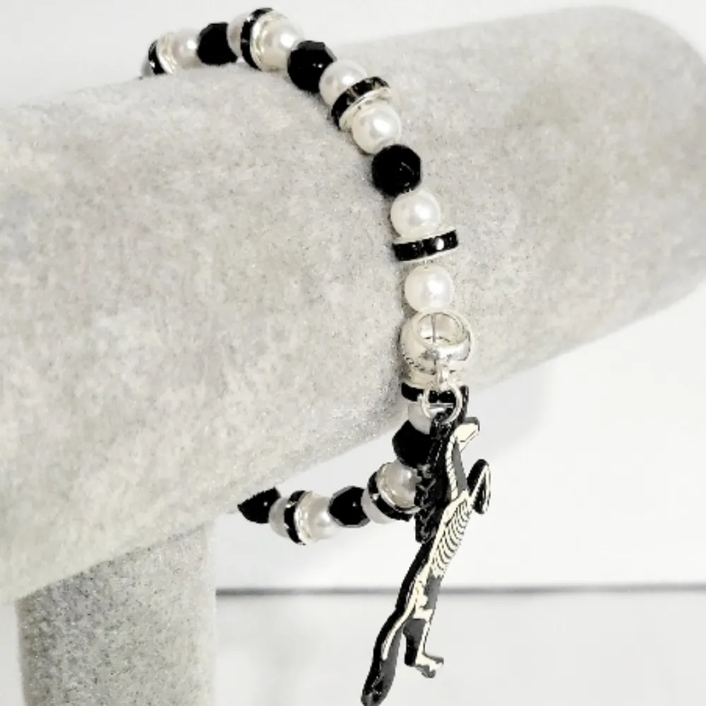 Hand Crafted Black and White Beaded with Unicorn Skeleton Charm Bracelet - Image 2
