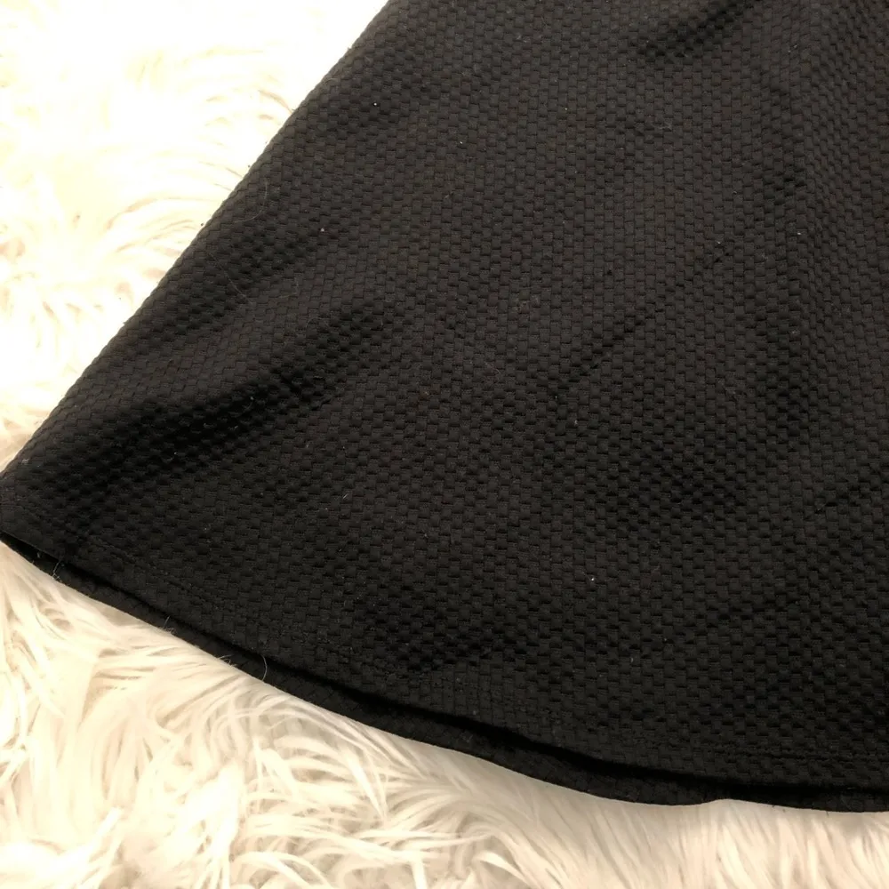 H&M Mini A-Line Flare Skirt Black Textured - Image 4