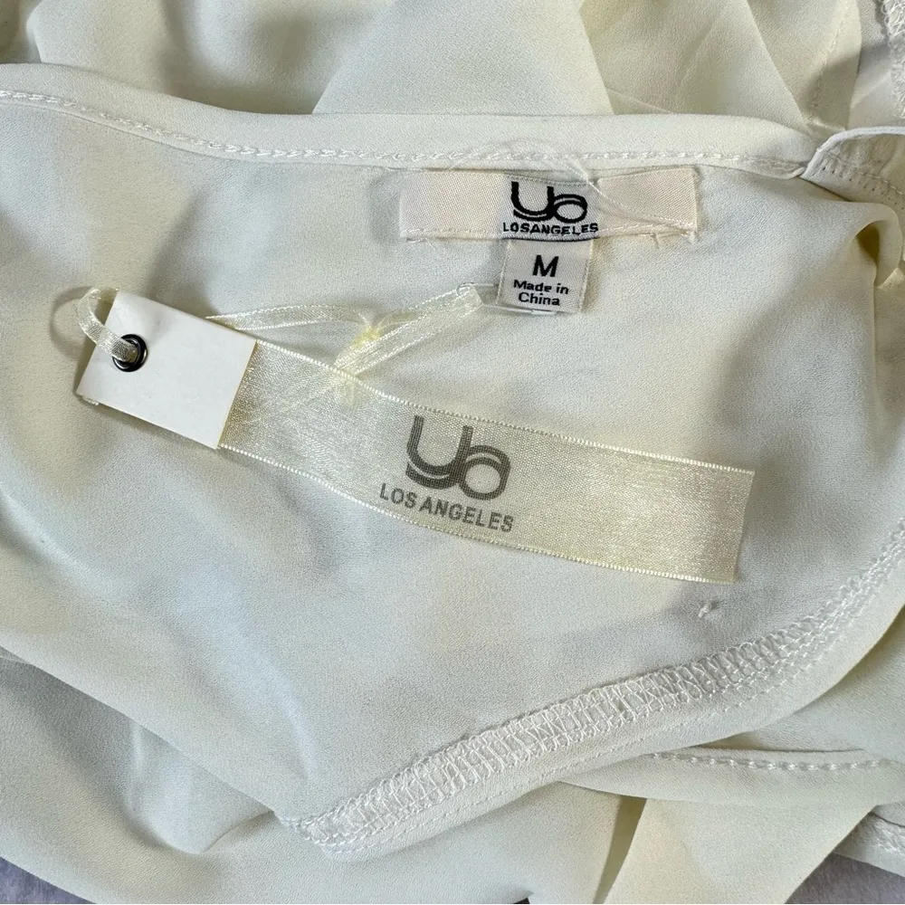 Silk Blend Sleeveless Backless Cream Blouse with Lace Cutouts by Ya Los Angeles - Image 12