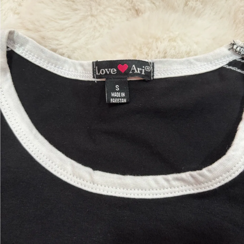 Classic Black Dress with White Trim - Image 2