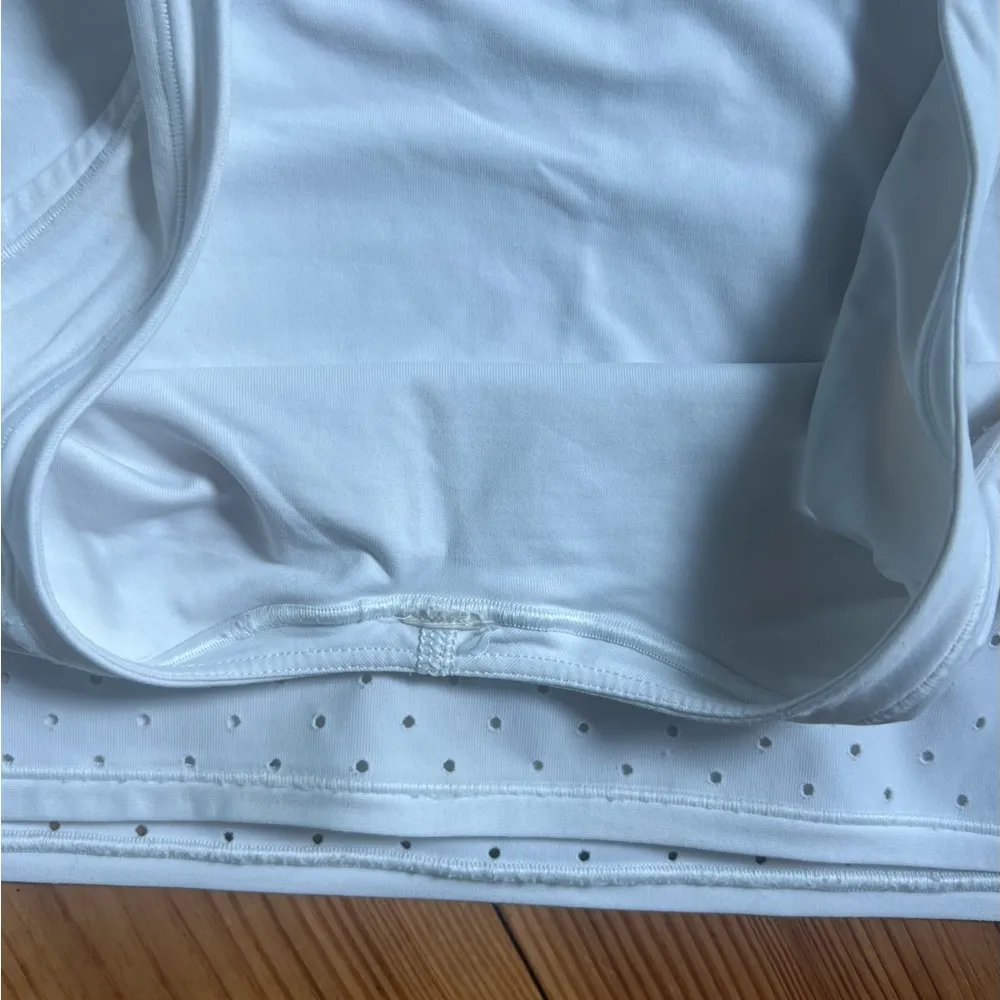 Cropped, All White Lululemon Tank Top With Mesh Bottom - Image 4