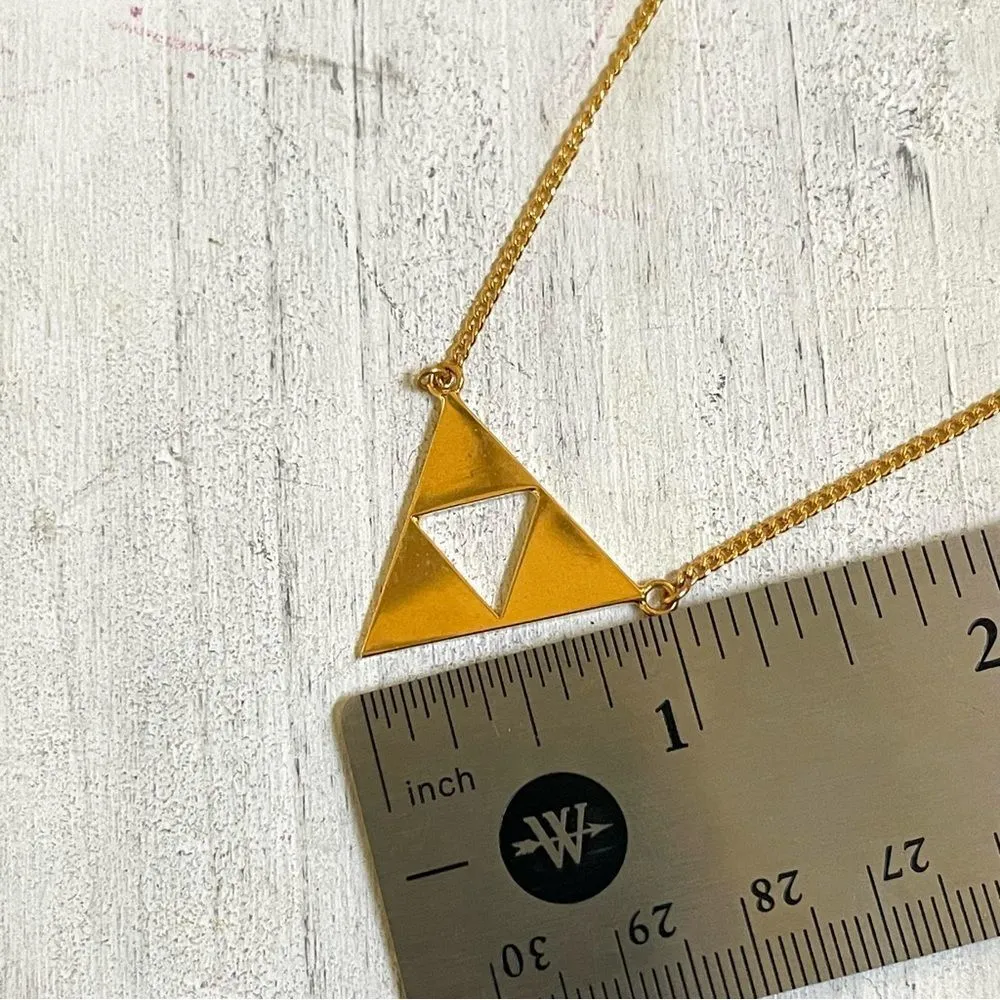 Trina Turk gold tone cut out triangle pendant necklace - Image 7
