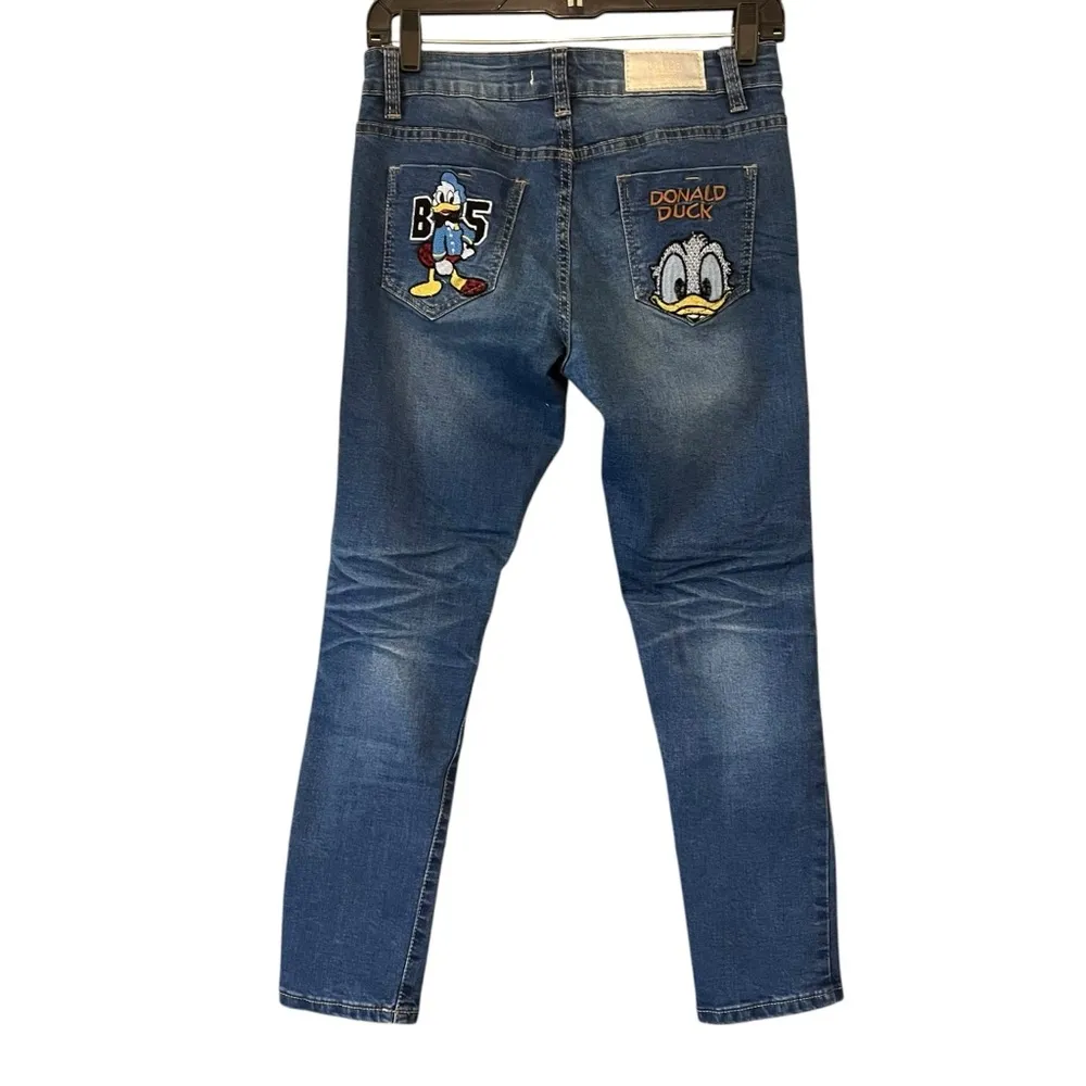 Tales Distressed Donald Duck Embroidered Character Skinny Ankle Jeans, Sz 28 Blue - Image 2