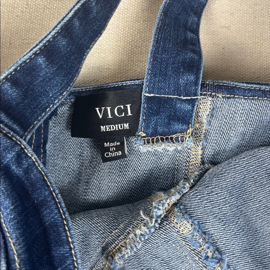 Vici Classic Blue Denim Bustier Dress
Size: Medium - Image 8