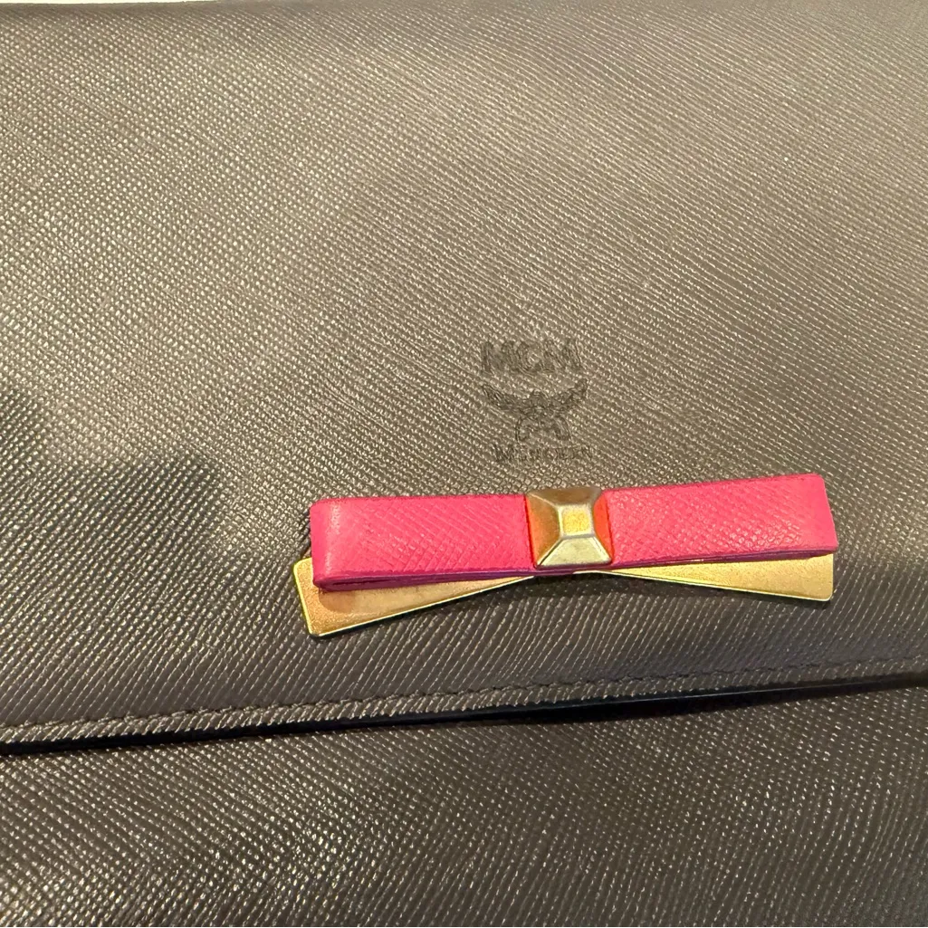 MCM Visetos Mina Crossbody Bag Dark Grey with a Pink Bow Accent - Image 14