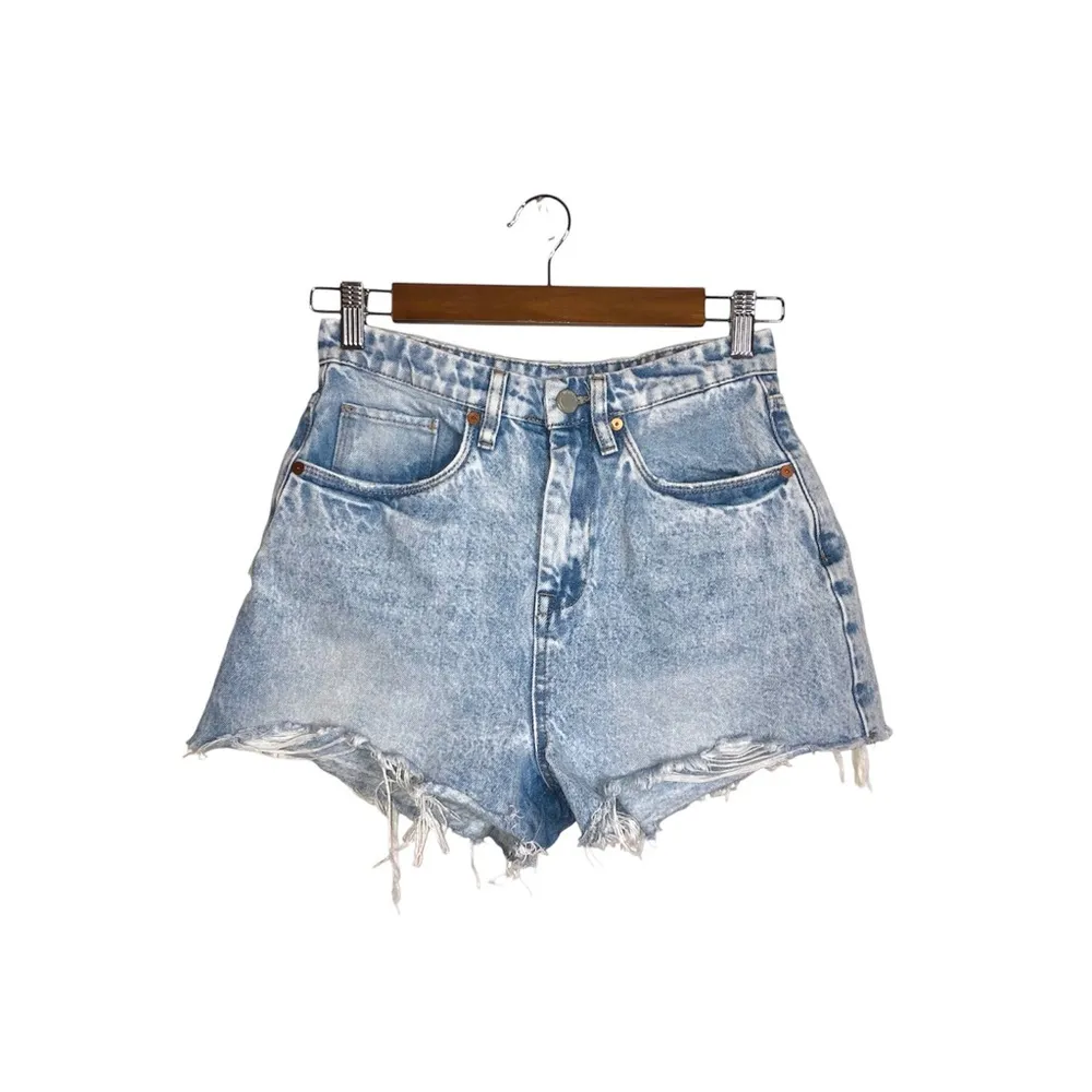 The Reeve Ultra High-Rise Frayed Raw Hem Light Wash Denim Shorts - Image 4