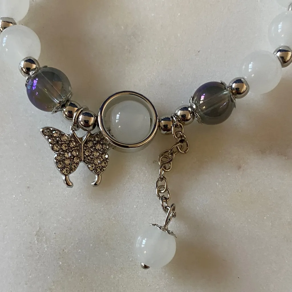 Chic White Beaded Bracelet with Butterfly Charm - Image 2