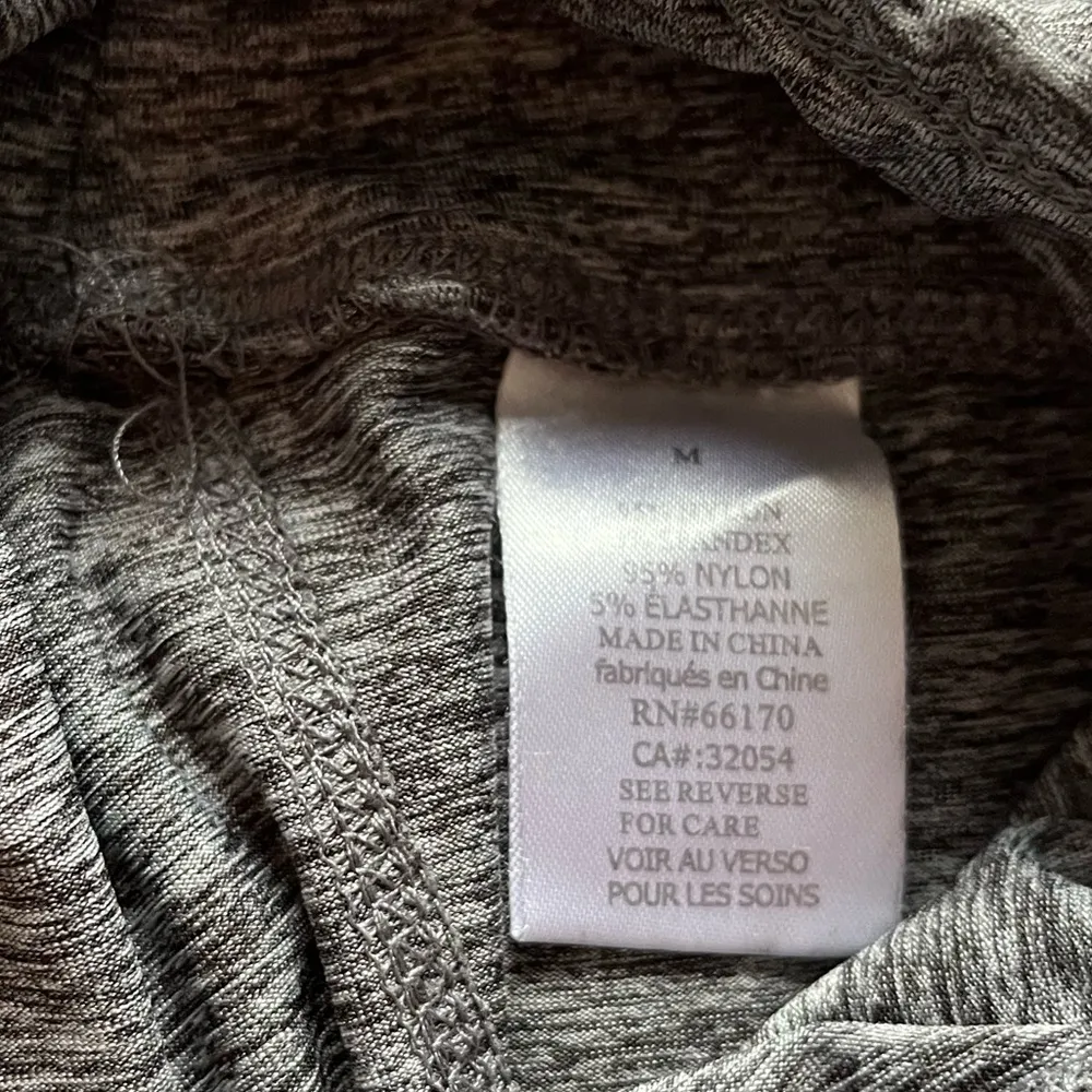 Out from under gray M leggings - Image 3