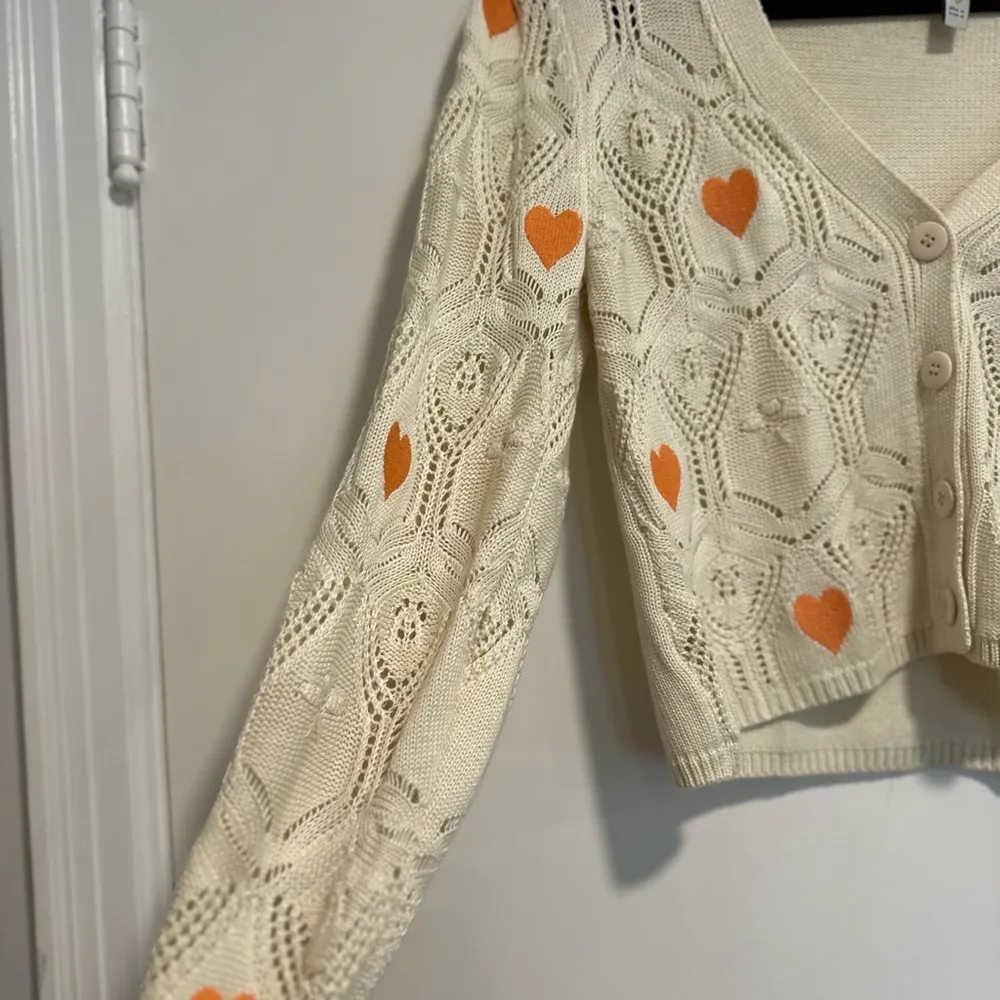 Blue Steel Medium Cream Open Knit Button cardigan w/ Orange Embroidered Hearts. - Image 9