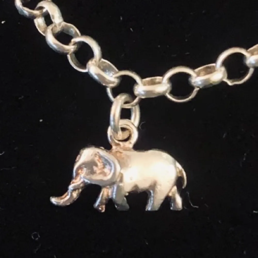 Sterling silver & amethyst lucky charm bracelet. - Image 2