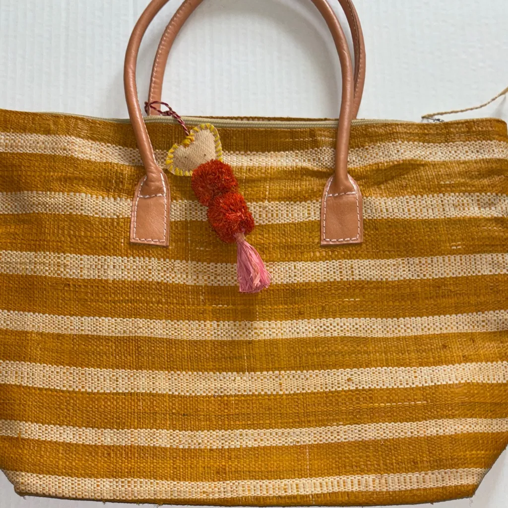 Striped Cream and Golden Orange Women's Woven Straw Bag with Tassel Design Tan - Image 1