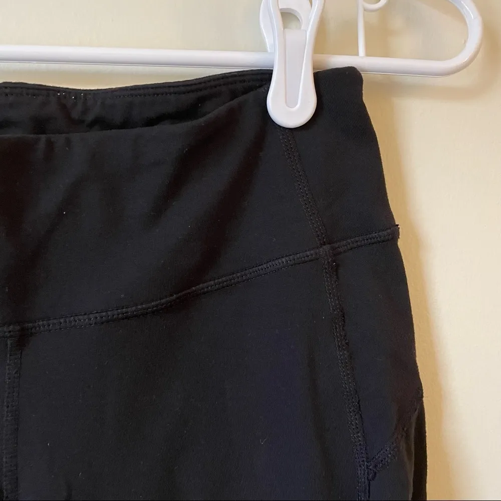 Athleta cropped black leggings cutout ankle detail athletic pants yoga comfort - Image 2