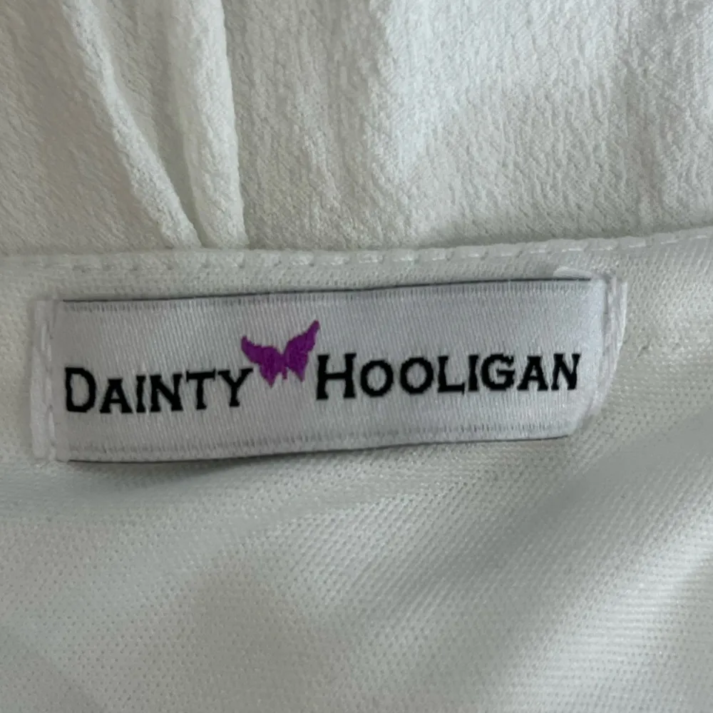 Dainty Hooligan White Dress with Bow Accent - Image 4