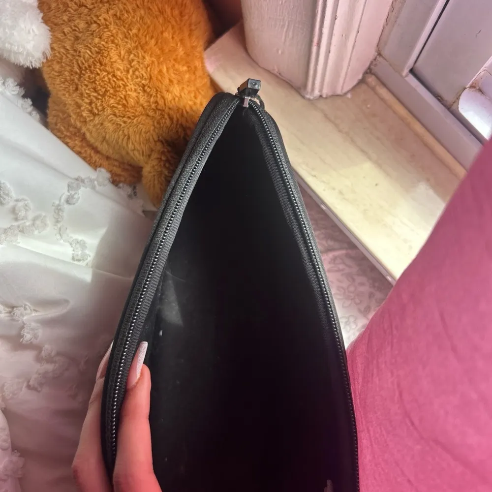 SKIMS Black Cosmetic Bag Sleek Design - Image 4