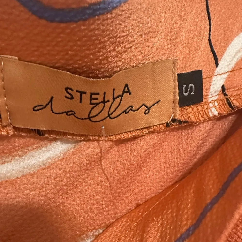 Stella Dallas Elegant Orange Patterned Skirt - Image 4