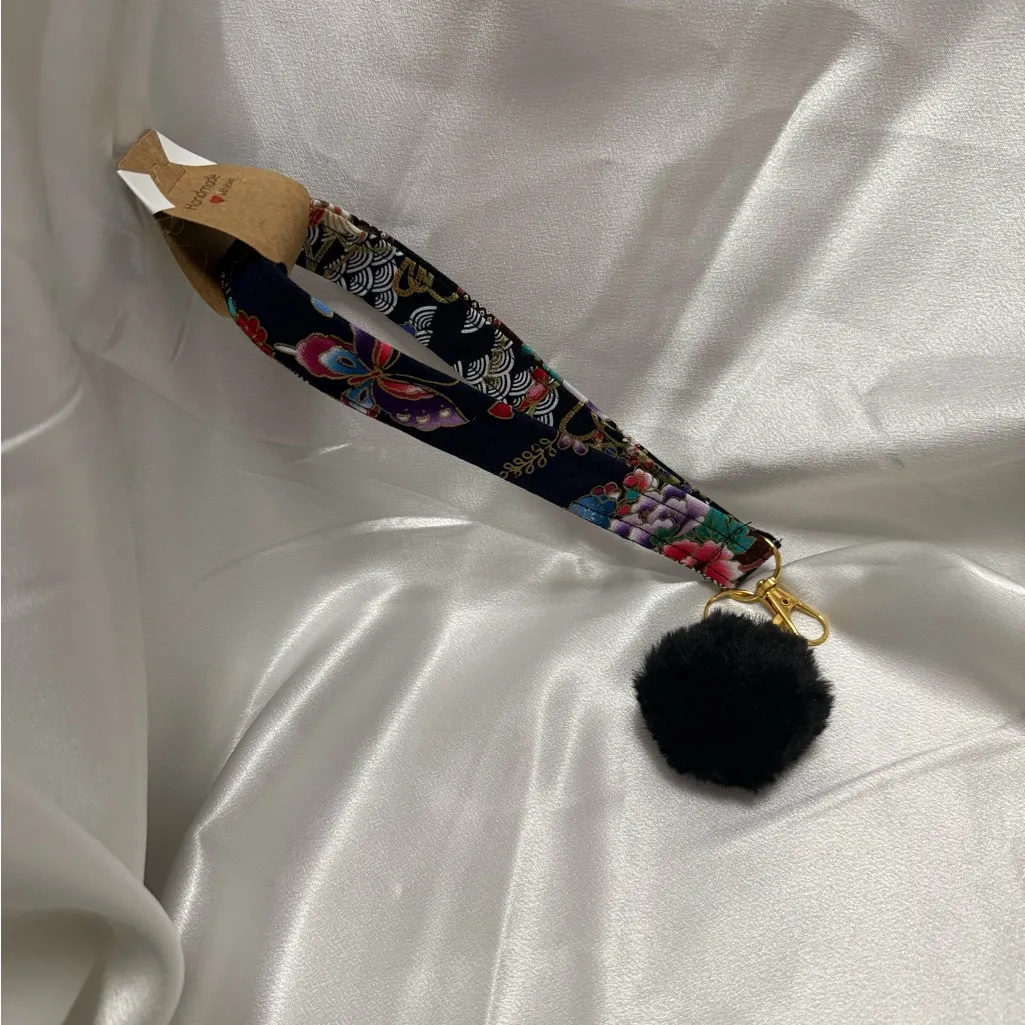 Handmade Floral Butterfly Wristlet Keychain with Black Pompom - Image 4