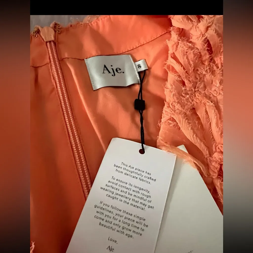 Aje Vibrant Orange Midi Dress size 8
FLORENTIAL TEXTURED MIDI DRESS - Image 6