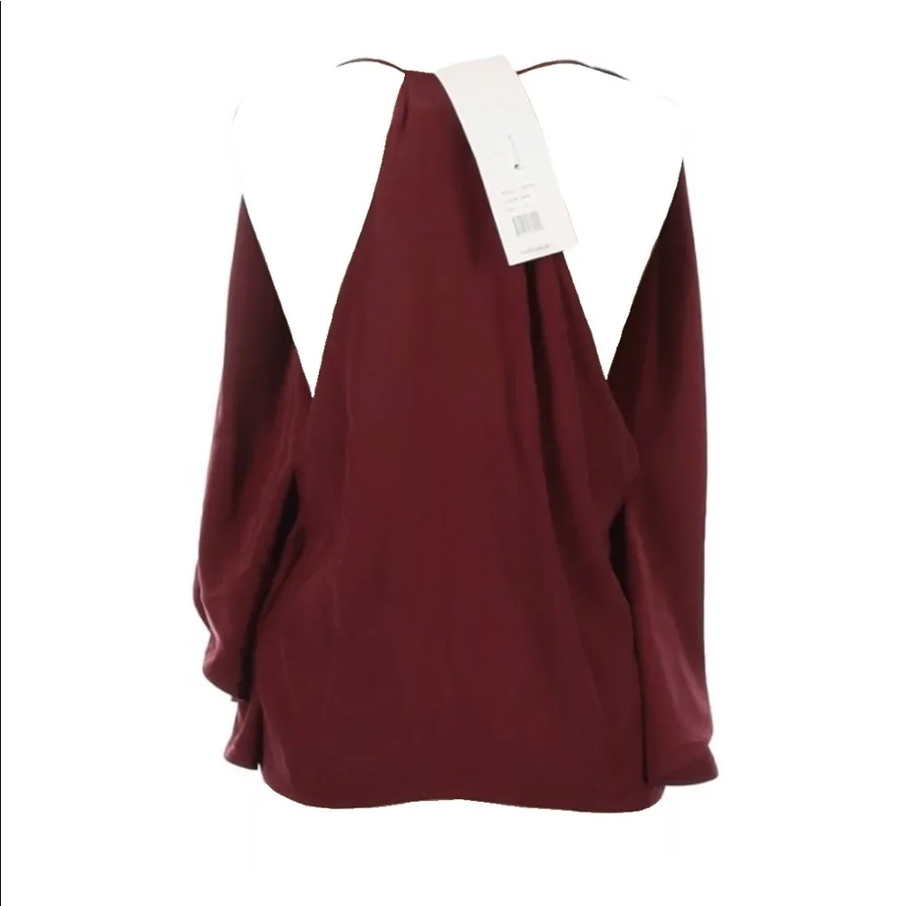 Robert Rodriguez new ā
Draped Overlay Strappy Silk Cami Top ā
Wine ā
Size 12 ā
- Image 4