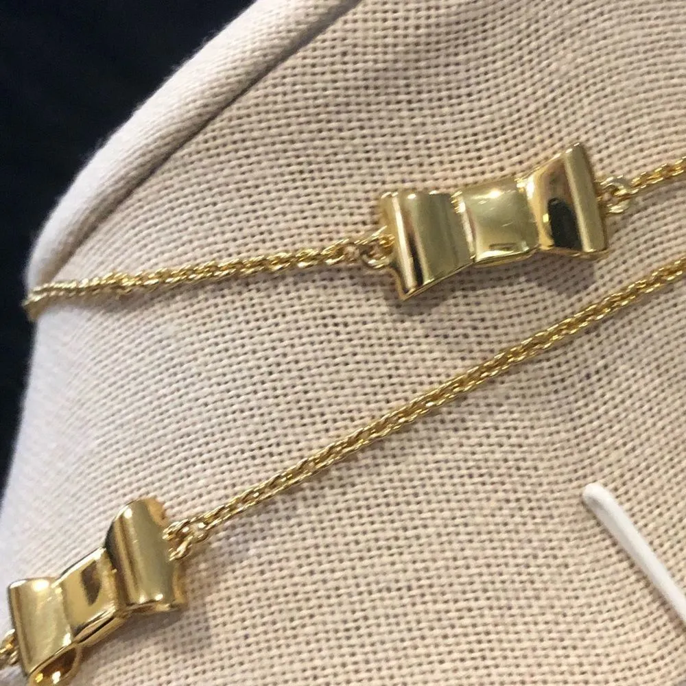 KATE SPADE Gold Tone Gold Enamel Bow Long Necklace - Image 12