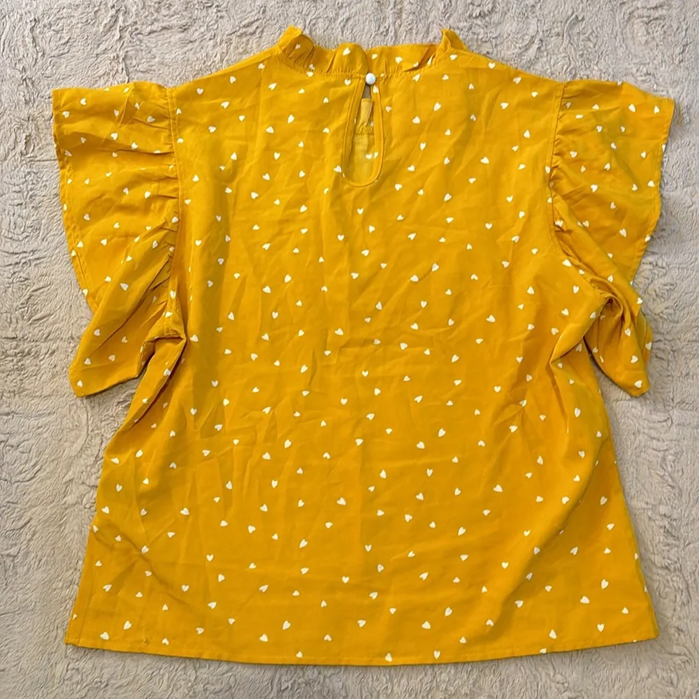Heart print blouse in size L - Image 9