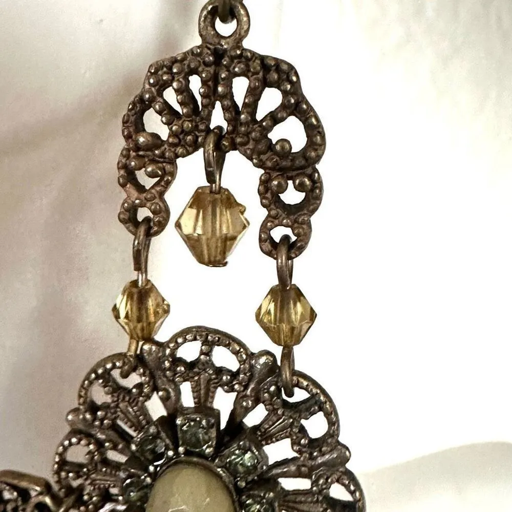 Green and brass tone chandelier earrings - Image 9