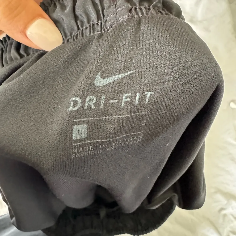 Size Large Black with white accent Nike running shorts - Image 2