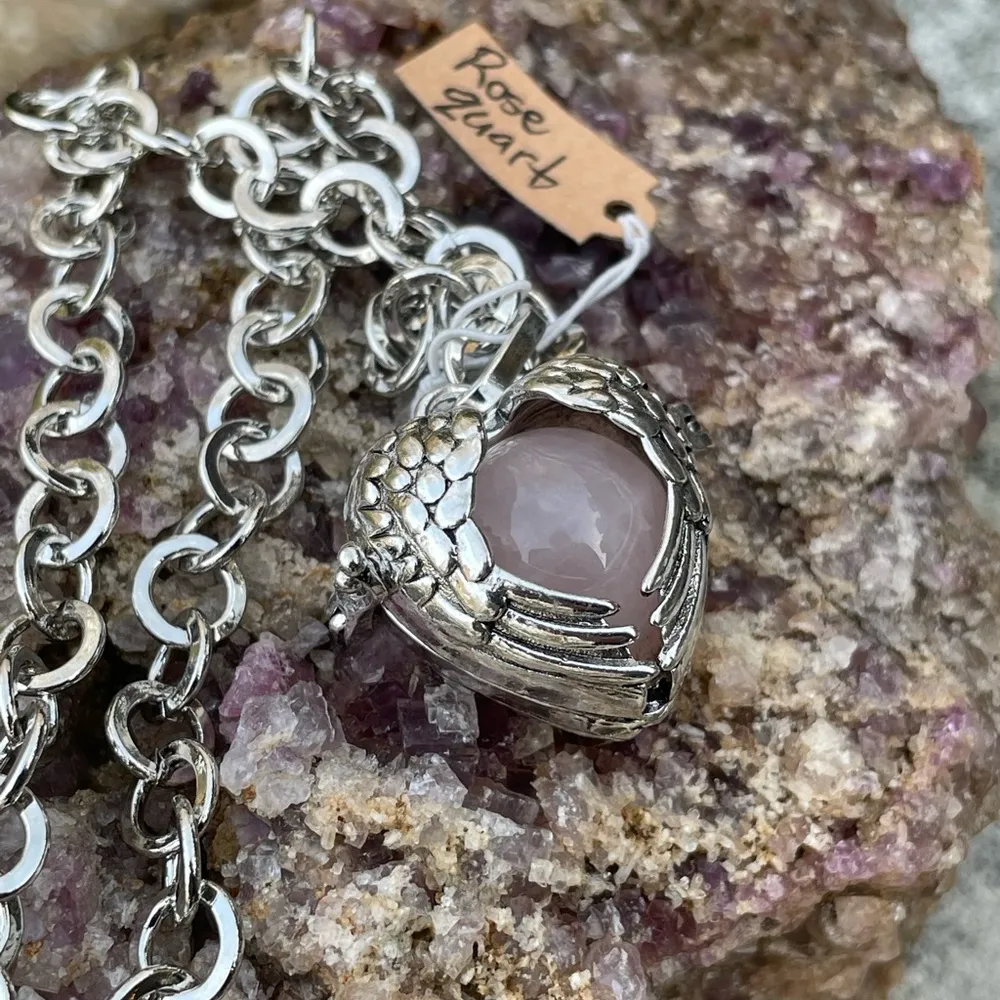 Rose Quartz gemstone in a winged heart shaped necklace cage. 36”chain. Heart o… - Image 4