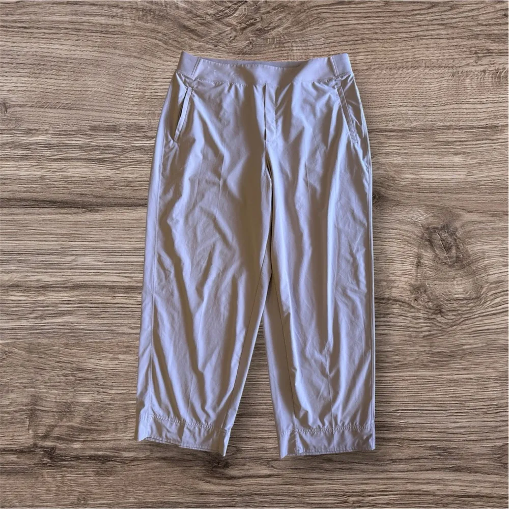 Athleta straight-leg joggers in size 18. These pants have a relaxed fit, a wide - Image 5