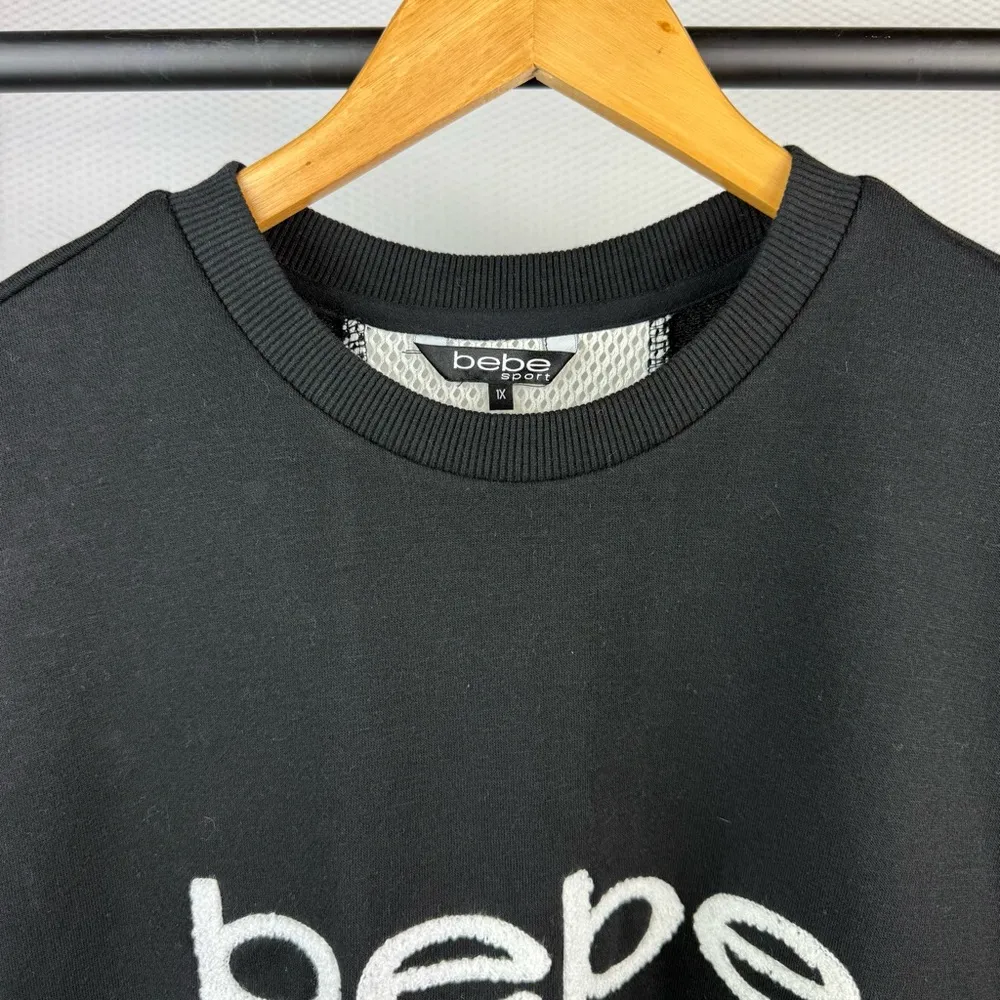 NEW Bebe Plus sport black short sleeve with sport patch woman’s shirt Size 1X - Image 2
