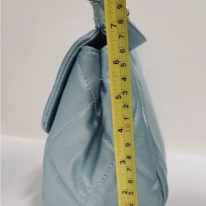 Light and ethereal quilted convertible crossbody rests like a dream on your arm - Image 11